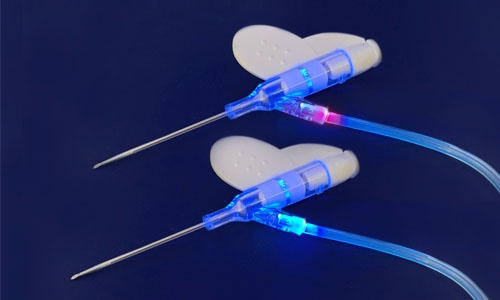 Adhesives with red and blue fluorescing are used to bond catheters to enable visual quality inspection.